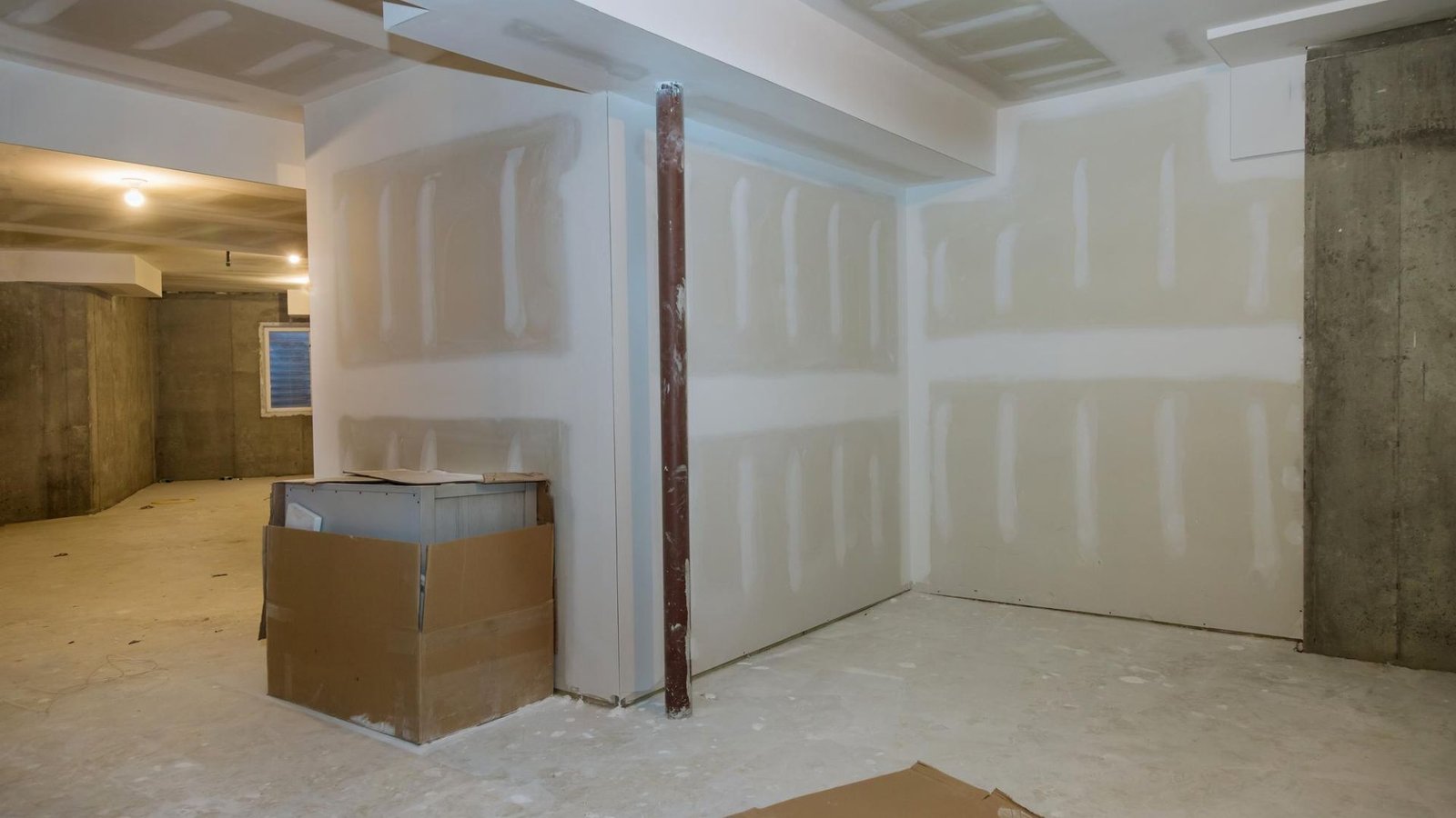 New drywall hung and taped in a basement finish by a drywall contractor in West Valley City, UT