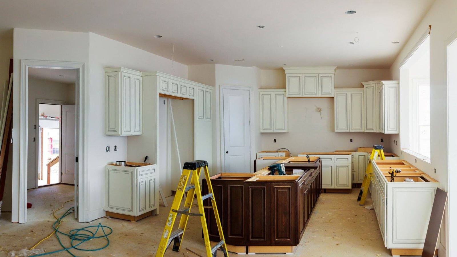 Kitchen remodel in progress with new cabinets and island being installed in West Valley City, UT